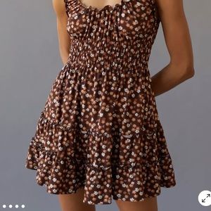 Swingy mini dress from Urban Outfitters topped with a ditzy floral print.
